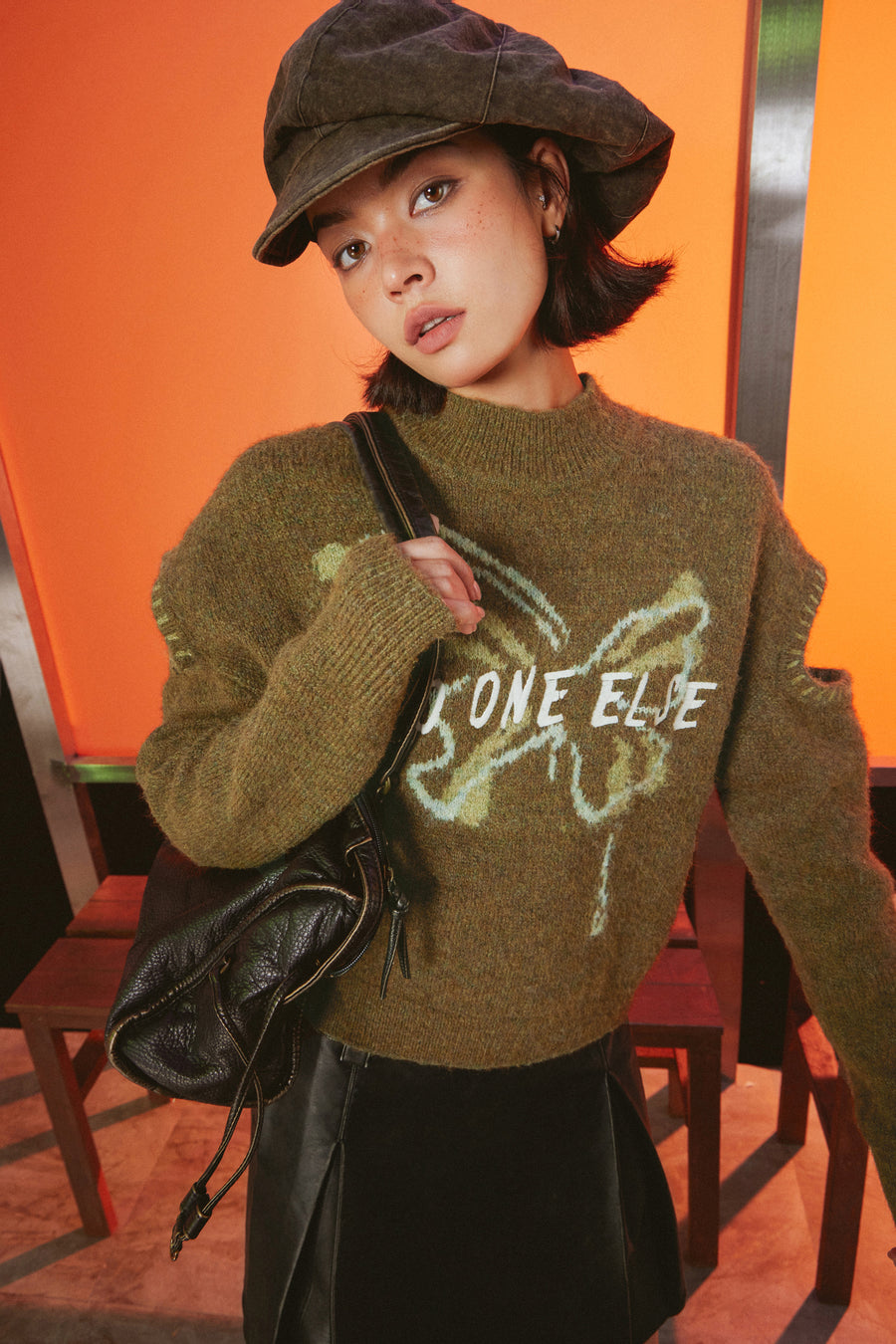 CHUU Butterfly Logo Sleeve Slit Knit Sweater