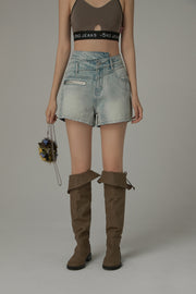 Asymmetrical Button Distressed Denim Shorts