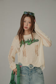 Distressed Long Sleeve Unbalanced Knit Top