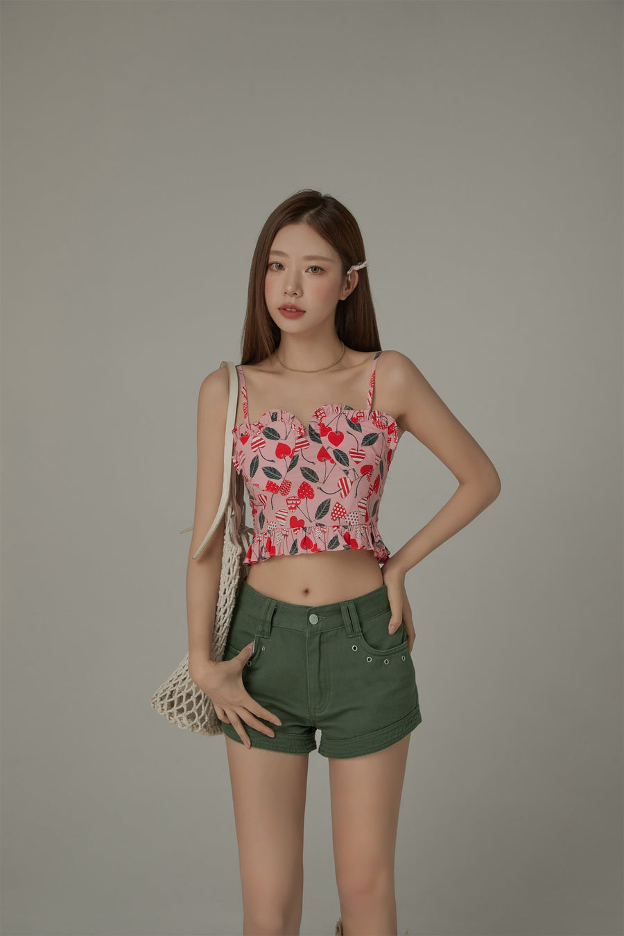 CHUU Heart Printed Ruffle Bustier Top