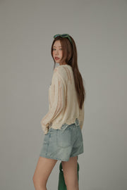 Distressed Long Sleeve Unbalanced Knit Top