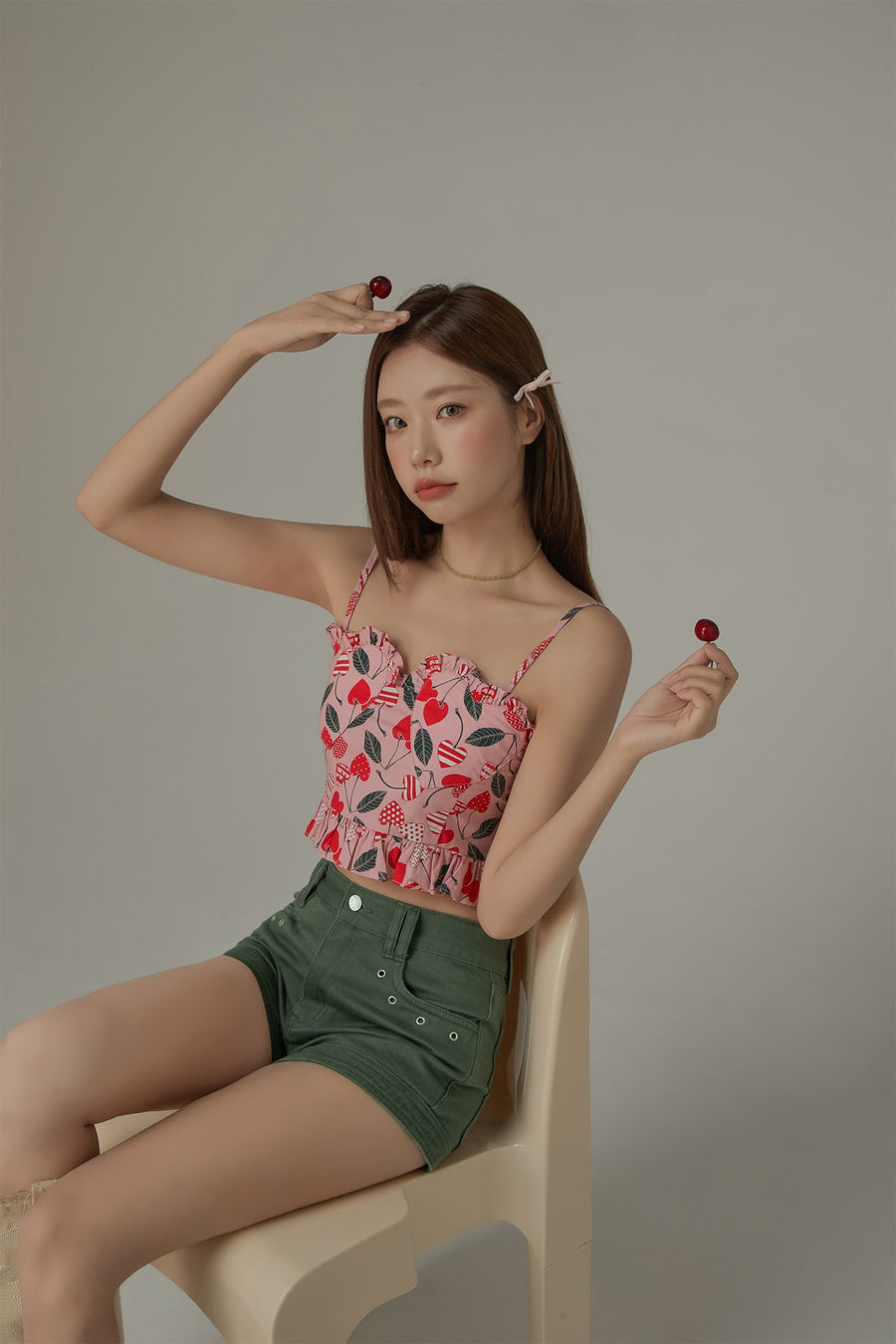 CHUU Heart Printed Ruffle Bustier Top