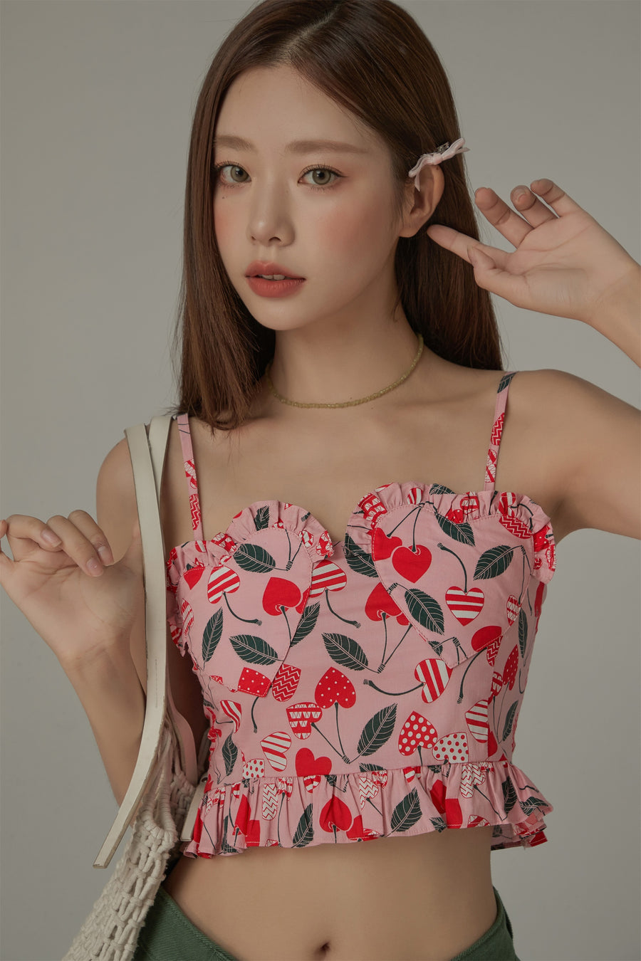 CHUU Heart Printed Ruffle Bustier Top