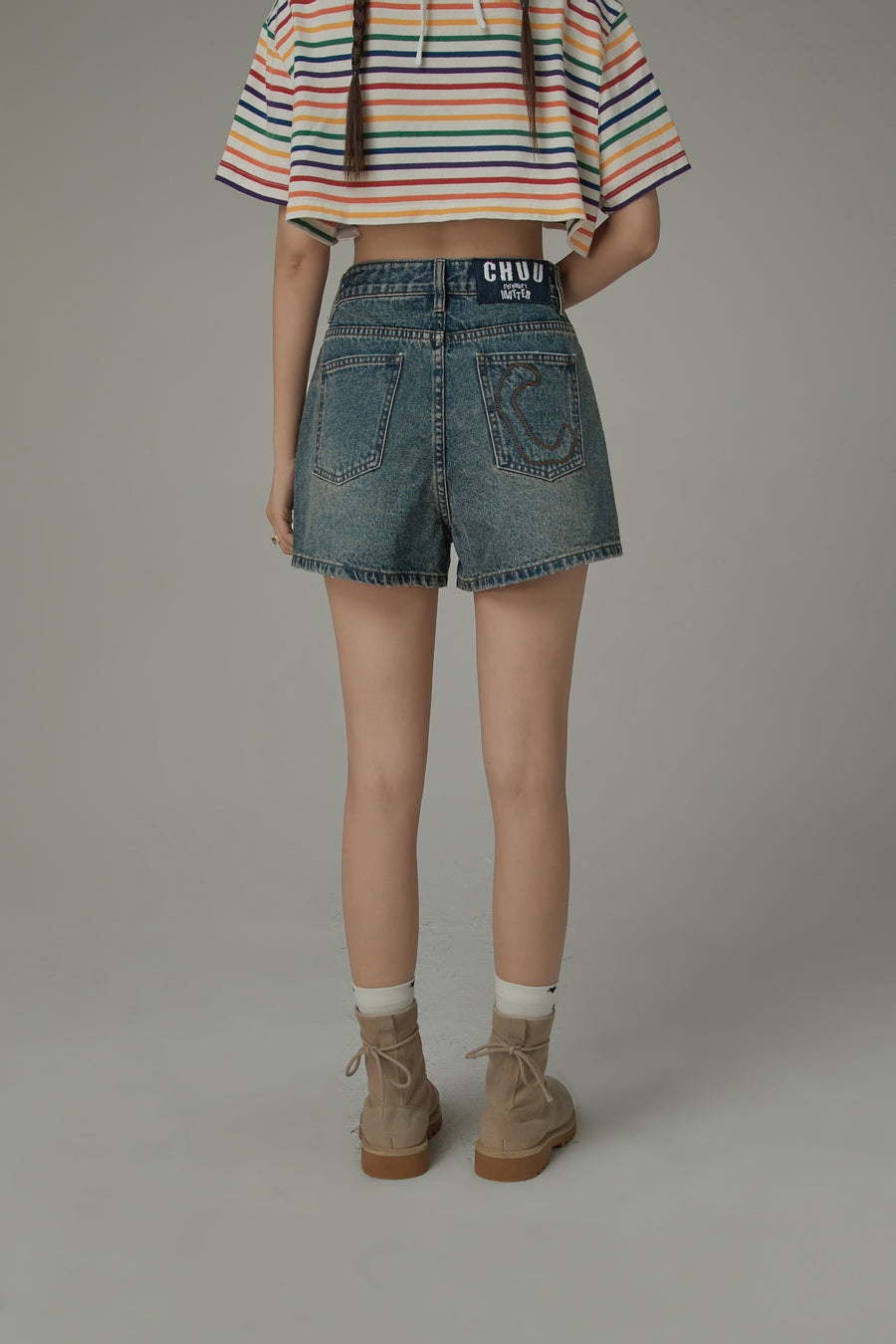 CHUU Asymmetrical Button Distressed Denim Shorts