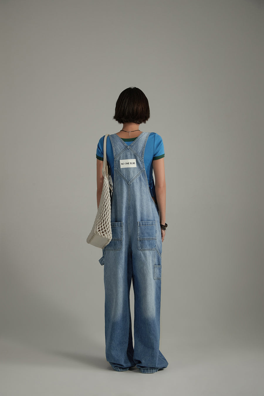 CHUU Washed Denim Suspender Jumpsuit