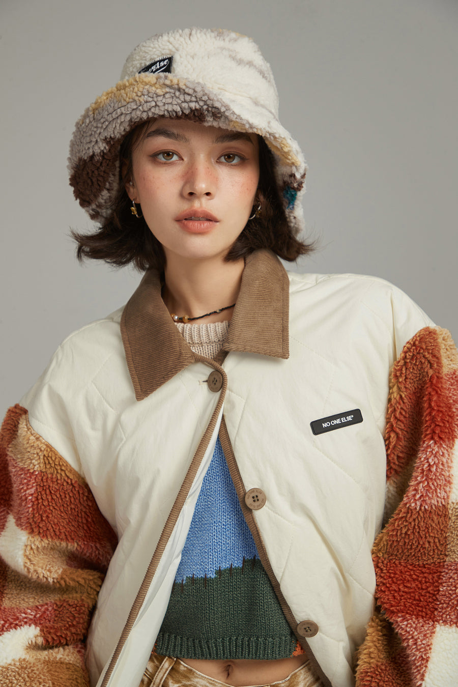 CHUU Check Sleeve Quilted Sporty Jacket