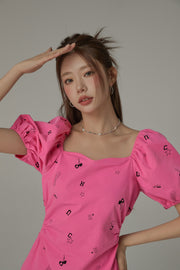 Chuu Symbols Ruffled Side Cutout Puff Short Sleeve Mini Dress