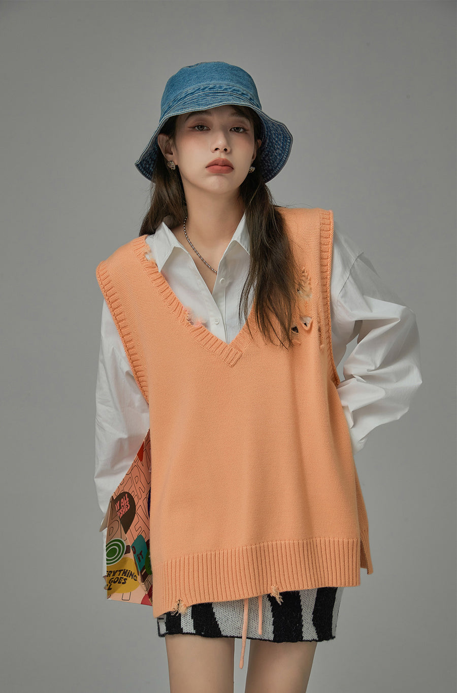 CHUU Not A Cliche Destroyed Knit Vest