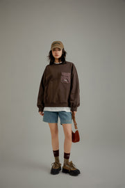 Pocket Loose Fit Sweatshirt