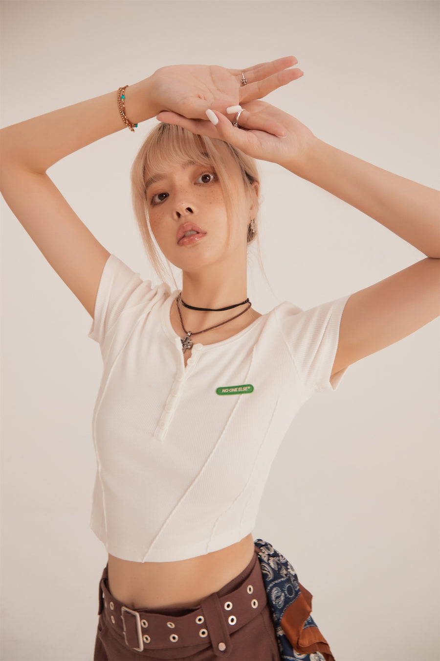 CHUU Unbalanced Button Crop Top