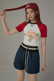 Chuu Circus Contrast Raglan Cropped T-Shirt