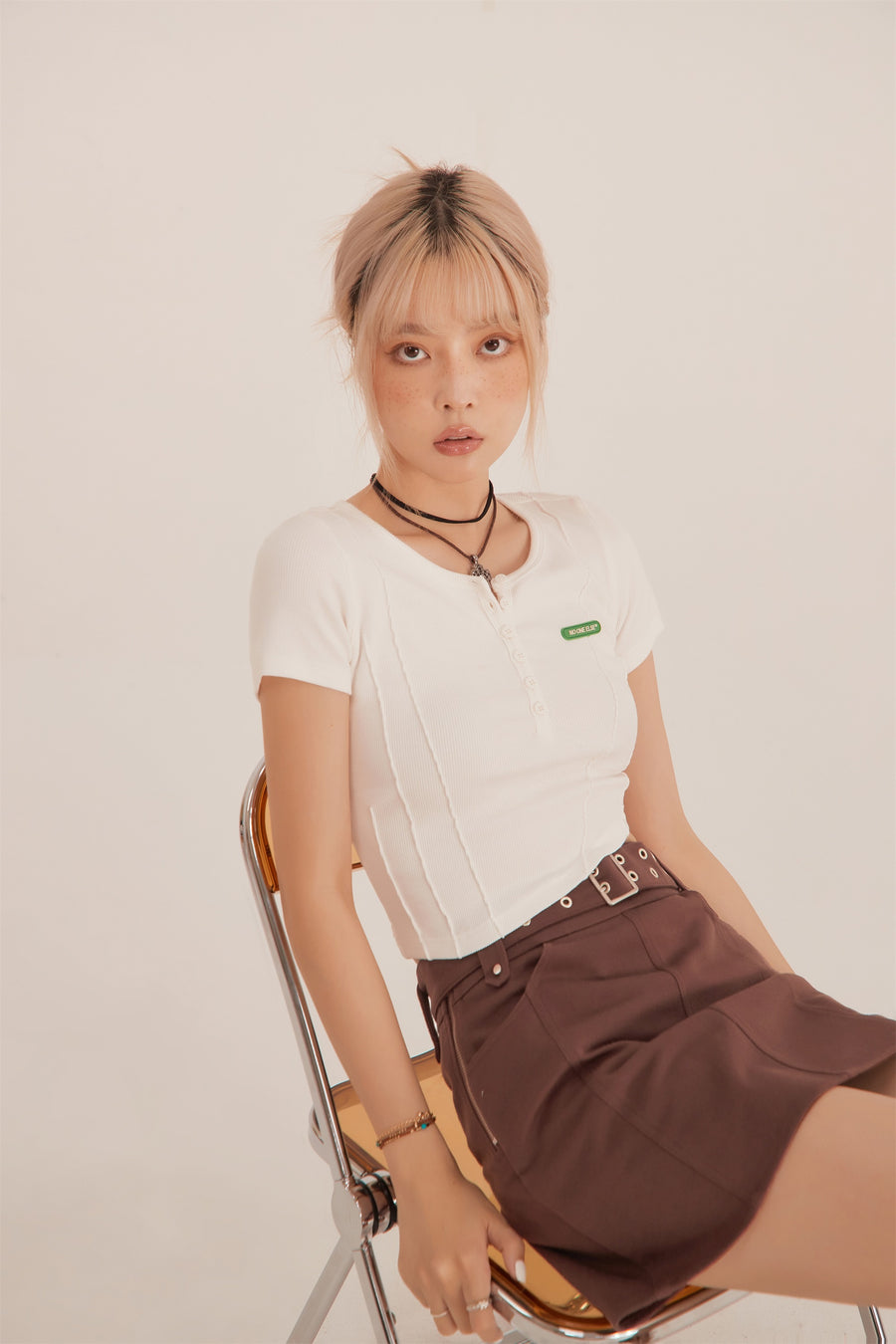 CHUU Unbalanced Button Crop Top