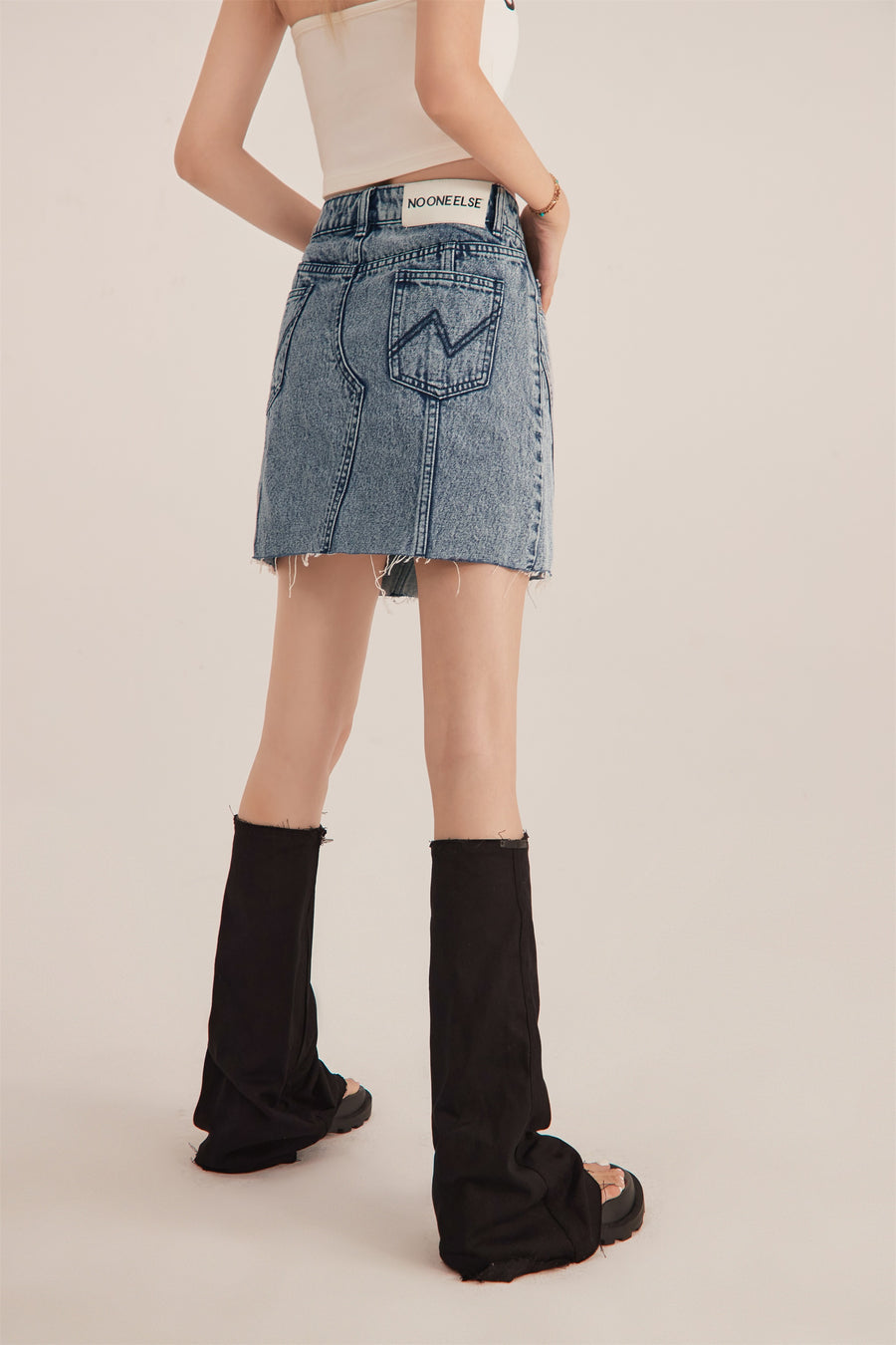 CHUU Unbalanced Cut Denim Mini Skirt