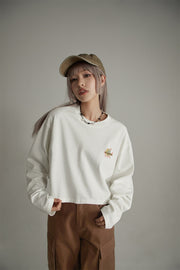 Noe Embroidered Loose-Fit Crop T-Shirt