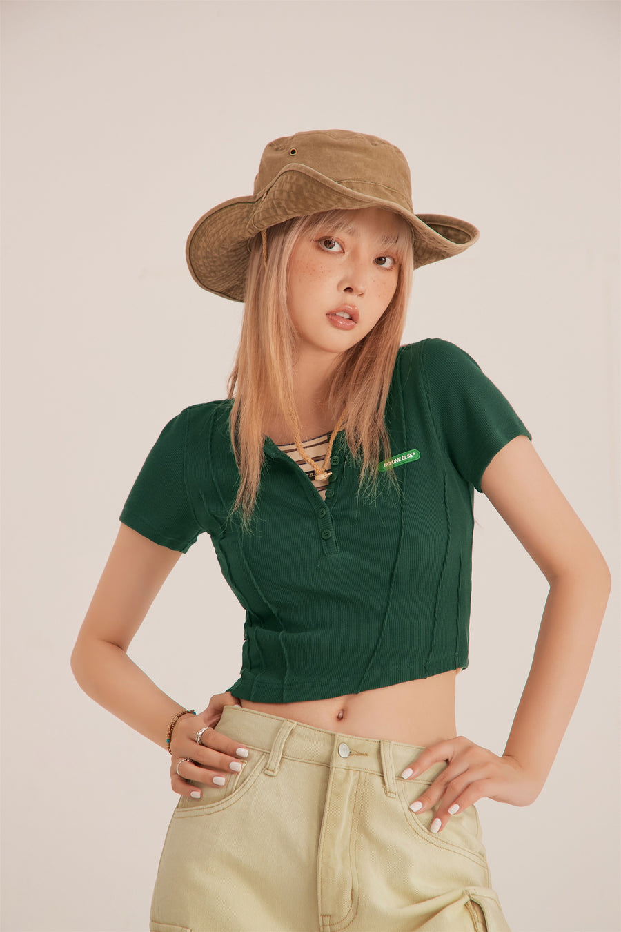 CHUU Unbalanced Button Crop Top