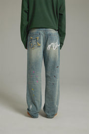 Painted On Wide Washed Denim Jeans