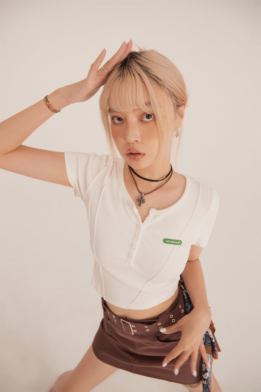 CHUU Unbalanced Button Crop Top