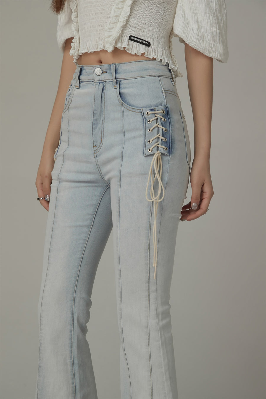 CHUU Lace Up Pocket Slit Bootcut Light Wash Denim Jeans