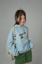 We Are In The Present Frog Logo Loose Fit Sweatshirt